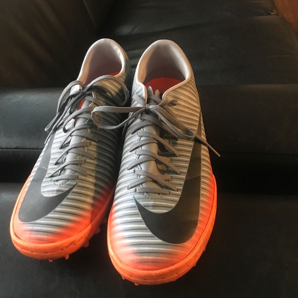 grey and orange CR7 Nike Mercurial soccer cleats